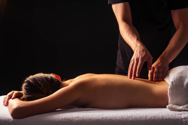 Relaxing Spa Setting with candles and towels